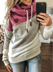Close-up detail of women's cowl neck hoodie featuring stylish burgundy and grey color block