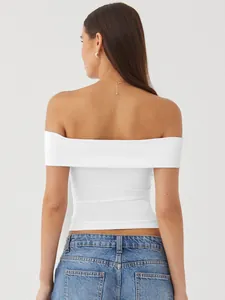 Rear view of white off-the-shoulder top with a tight fit and elegant neckline detail