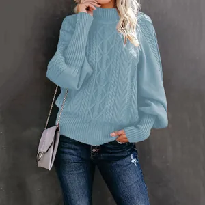 Stylish light blue cable knit sweater featuring elegant lantern sleeves for winter