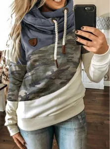 Detail of women's cowl neck hoodie with color-block camouflage and drawstring design.