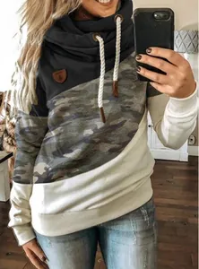 Close-up detail of women's trendy color-block cowl neck hoodie with camouflage print pattern