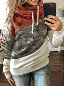 Detailed view of women's cowled neck hoodie featuring rust red and camouflage splicing