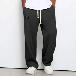 Men's loose waffle texture sweatpants with straight leg and drawstring waist design