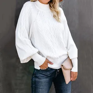 Elegant white cable knit crew neck sweater with loose lantern sleeves for winter.
