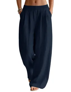 Detailed view of navy blue linen wide-leg pants featuring elastic waist and side pockets
