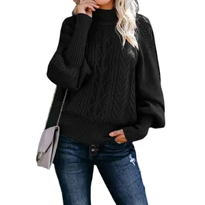 Elegant black cable knit lantern sleeve sweater with a relaxed fit and crew neckline.
