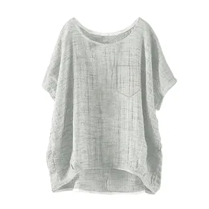 Front view of a loose casual light grey linen top for women featuring a single chest pocket