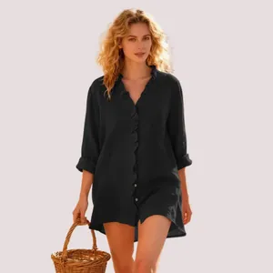 Elegant women's black long-sleeved ruffle shirt featuring a stylish V-neck design