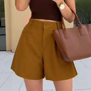 Women's high-waisted wide-leg A-line shorts in mustard yellow for casual style.