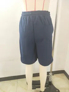 Detailed back view of navy blue waffle knit casual shorts for men's summer wear.