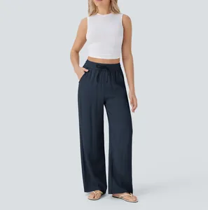 Full body view of women's navy blue high-waisted linen wide-leg pants with drawstring waist