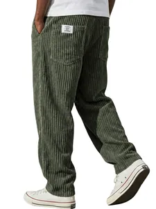 Macro view of men's green corduroy pants showing the striped texture and back pocket.