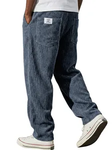 Close-up detail of blue corduroy pants featuring striped texture and back pocket label