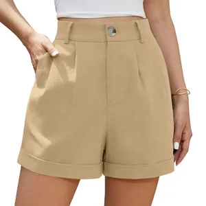 Close-up of women's high-waisted khaki cotton linen shorts with button detail