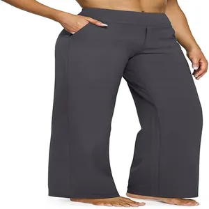 Vista dettagliata di pantaloni larghi grigio antracite da donna con tasche laterali