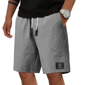 Moderne graue Herren-Casual-Strandshorts aus Waffelstrick mit bequemem Kordelzug am Bund