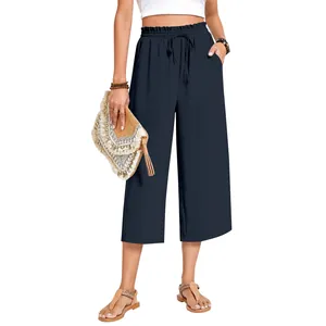 Women's high-waisted linen wide-leg pants with drawstring waist in navy blue.
