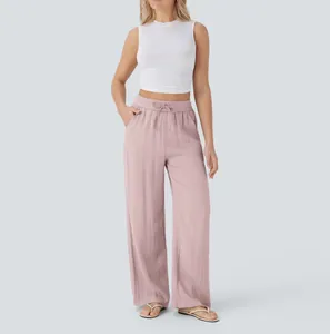 Fashionable high-waisted wide-leg linen pants with drawstring waist for casual beach wear