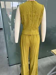 Detailed back view of mustard yellow cotton linen casual vest and wide-leg trousers set