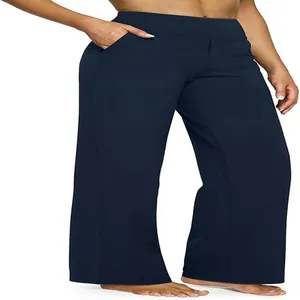 Vista dettagliata dei pantaloni a gamba larga blu scuro a vita alta con tasche laterali