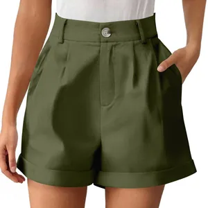 Detail of high waisted army green cotton linen shorts with button closure