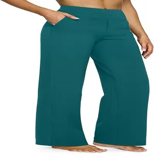 Vista dettagliata di pantaloni casual a gamba larga color verde ottanio per donne
