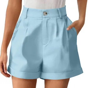 Detail shot of light blue cotton linen high-waisted shorts with button and pleats