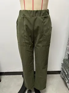Detail view of women's army green corduroy straight leg pants with elastic waist