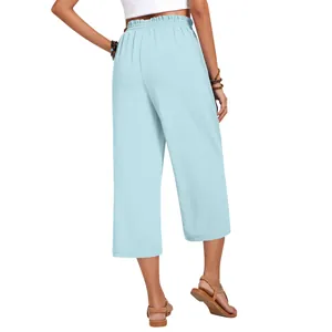 Rear view of women's light blue linen wide-leg pants featuring a comfortable elastic high waist.