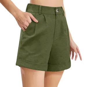Detail of casual olive green high waisted cotton linen shorts with button and pockets