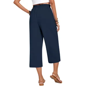Back view of navy blue linen high-waist loose wide-leg cropped trousers for women