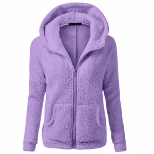 Detailed shot of a purple fuzzy hooded jacket featuring front zipper and cozy fleece texture