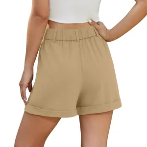 Back view of women's khaki high-waisted cotton linen shorts with cuffed hem detail