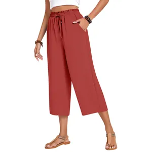 Women's high-waisted linen wide-leg pants in rust red with elastic drawstring waist