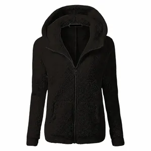 Detailed view of the black plush fleece fabric and zipper on this hooded jacket.