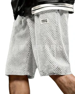 Macro view of men's white jacquard lattice casual shorts with a loose fit design