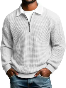 Detail view of a white waffle knit long-sleeve polo shirt for men featuring a zipper collar.