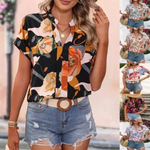 Detail view showing various colorful bohemian floral print V-neck shirts for women