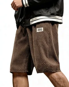 Detailed view of men's brown jacquard waffle knit shorts showing fabric texture