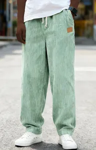 Men's green corduroy loose straight casual pants featuring a comfortable drawstring waist