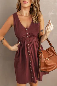 Elegant burgundy sleeveless mini dress with button front and elastic waist styling