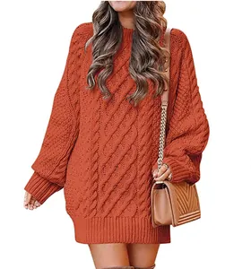 Vestido de punto trenzado oversize en color naranja quemado con cuello redondo clásico