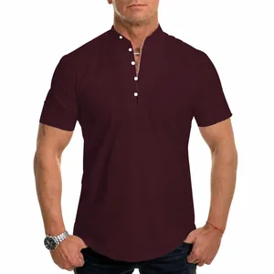 Detailed view of stylish burgundy short-sleeved men's shirt with white buttons