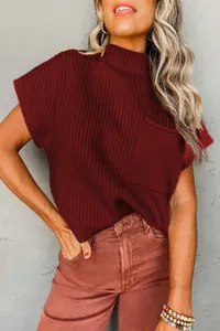 Detail view of a burgundy mock neck knit sweater vest with a chest pocket