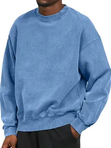 Close-up of heavy weight mineral washed blue sweatshirt with drop shoulder fit