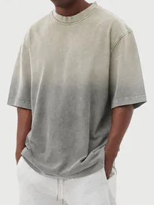 Macro view of acid-washed fabric texture on a gradient oversized streetwear men's T-shirt