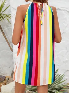 Detailed back view of a colorful striped halter neck dress showing the tie-back closure.