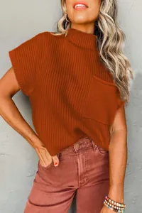 Close-up detail of orange knit sweater vest with pocket and half-high collar for women