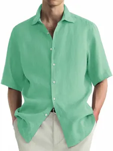 Close-up detail of a light green washed cotton casual short sleeve shirt for men