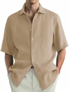Detail shot of a men's casual khaki cotton short sleeve shirt with a relaxed fit style.